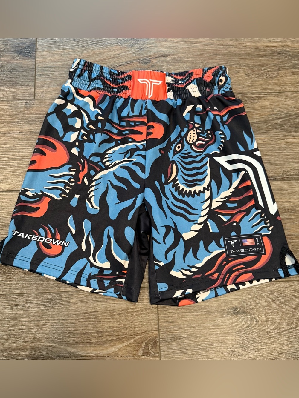 Takedown Youth Thai Tigers Blue & Orange Graphic Athletic Combat Shorts